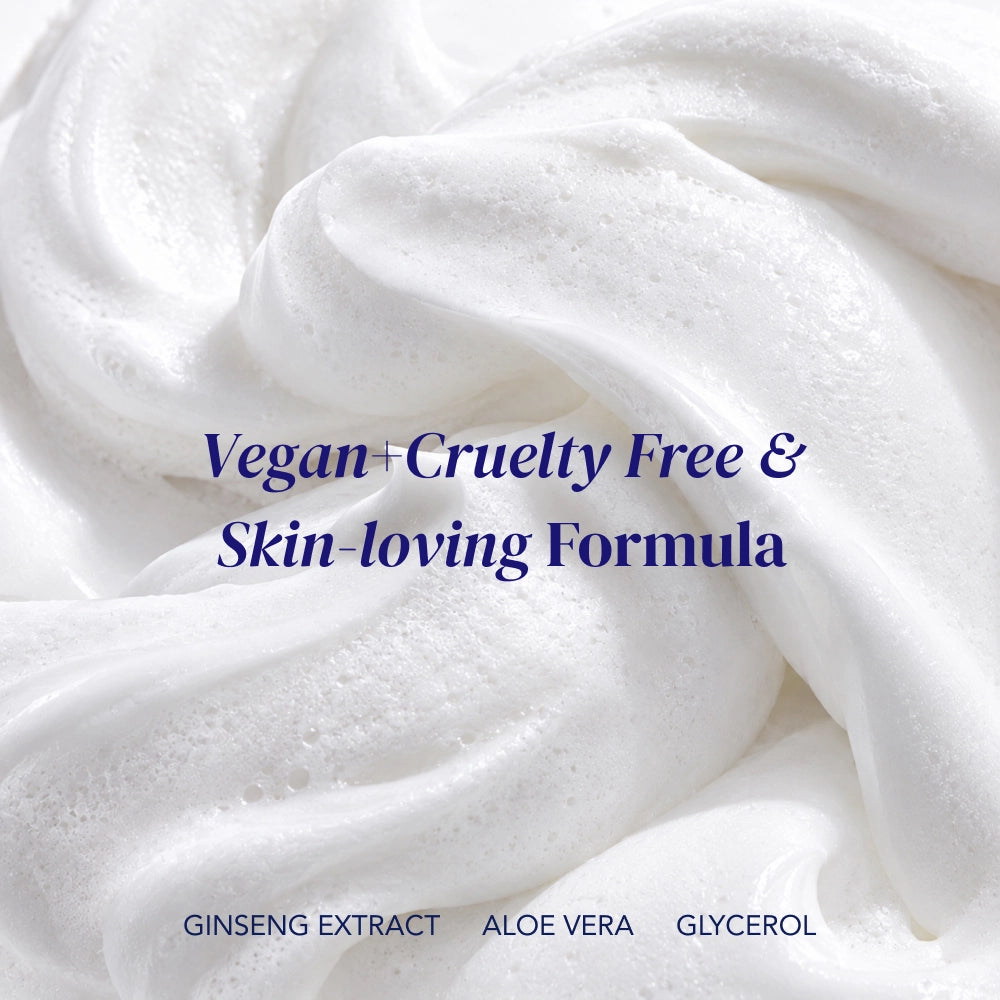 White creamy product texture with blue text reading 'Vegan + Cruelty Free & Skin-loving Formula' and smaller text at the bottom reading 'GINSENG EXTRACT ALOE VERA GLYCEROL'.
